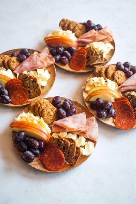 Cheese board for one, please! Make individual cheeseboards and create a fantastic first course, appetizer, heavy hors d'oeuvre, or the best snack ever! Simple cheeses, meats, fruits, and crackers are displayed on small wooden plates. Individual Antipasto Plate, Small Appetizer Table Display, First Course Recipes, Individual Grazing Boxes, Individual Appetizers, Grazing Boxes, Food Boards, Charcuterie Plate, Fingerfood Party