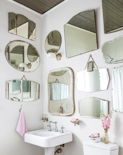 The five members of the Pata family successfully share a single bathroom—a Jack and Jill that sits between the children's rooms. A collection of vintage mirrors makes the bathroom appear larger. Vintage Bathroom Mirrors, Decorative Bathroom Mirrors, Mirror Gallery, Mirror Gallery Wall, Vintage Mirror Wall, Bad Inspiration, Vintage Mirrors, Vintage Bathrooms, Small Bathrooms