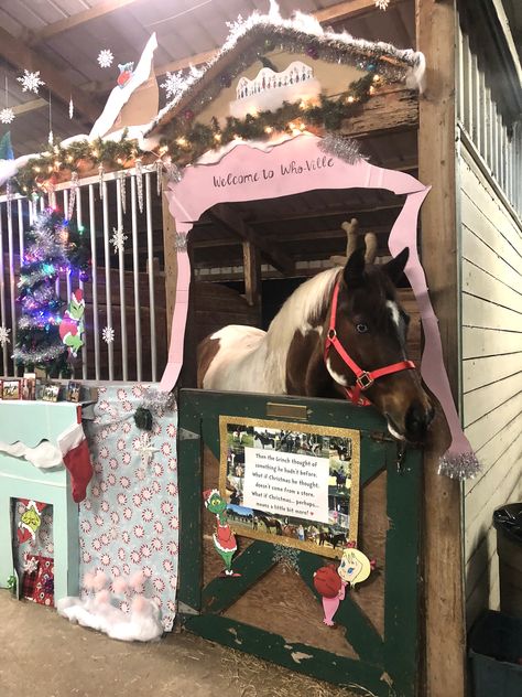 Grinch themed Christmas stall decorations for Apache this year. I turned my horse, Apache, into the Grinch’s dog, Max. I used a wire hanger, foam wrap and vet wrap to create Max’s antler that I then zip tied to my horses halter and covered with a red bow. There were so many fun scene’s to replicate in different places on the front of his stall. I even wrapped in the rest of the barn rwith pictures of them along with the quote about the meaning of Christmas. Christmas Horse Stall Decorating Ideas, Horse Stall Christmas Decorations, Christmas Horse Stall, Horse Stall Decorations, Horse Halloween Ideas, Pony Quotes, Christmas Stall Ideas, Grinch Themed Christmas, 4h Fair