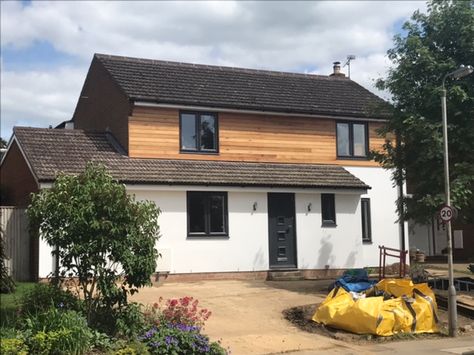 The timber in this house is the kind of replacement panelling option I am considering.  The rendering is appealing too, though we have to consider how this would look in isolation given surrounding houses. Dormer Cladding, 1970s House Exterior, Kitchen Extension Terraced House, 1970s House Remodel, Wooden Cladding Exterior, 1970s House Renovation, Wood Cladding Exterior, Old House Exterior, Rendered Houses