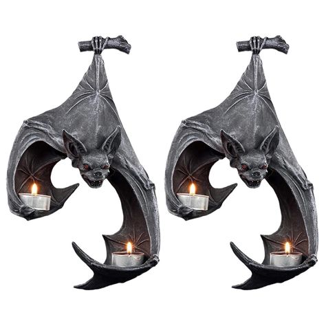 PRICES MAY VARY. * PREMIUM RESIN MATERIAL: The Bat Wall Candle Holder is made of high quality resin material. It is waterproof and wear-resistant. Once lit, the candles in this delicate candle holder create an elegant and glamorous look. * GOTHIC BAT DESIGN: Our candle holder is designed in the shape of a medieval Gothic bat. Its red eyes are full of spooky vibes, making it the perfect Halloween decoration. Its stylish and beautiful, full of character and can bring a retro feel to your room or p Halloween Candlesticks, Gothic Candle Holder, Thanksgiving Party Decor, Halloween Hanging Decorations, Wall Mounted Candle Holders, Gothic Candles, Hanging Bat, Bat Wall, Goth Home Decor