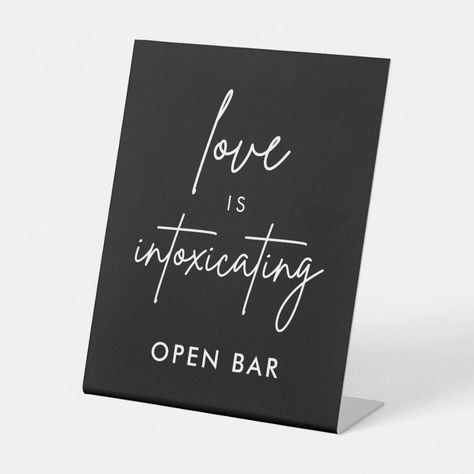 Love Is Intoxicating Black Wedding Open Bar Sign  Zazzle Love Is Intoxicating Sign, Love Is Intoxicating Sign Weddings, Love Is Intoxicating, Minimalist Black Wedding, Modern Wedding Bar, Alcohol Wedding, Wedding Open Bar, Menu Minimalist, Wedding Pedestal