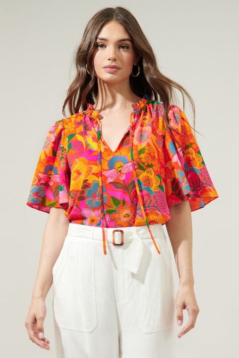 AGHHH SO CUTEEE SCENE KID OVER LOADD!! w :D Colorful Tops Outfit, Vibrant Casual Outfits, Groovy Outfit Women, Printed Tops Designs, Orange Top Outfit, Floral Shirt Outfit, Floral Top Outfit, Flouncy Sleeves, High Waisted Linen Pants