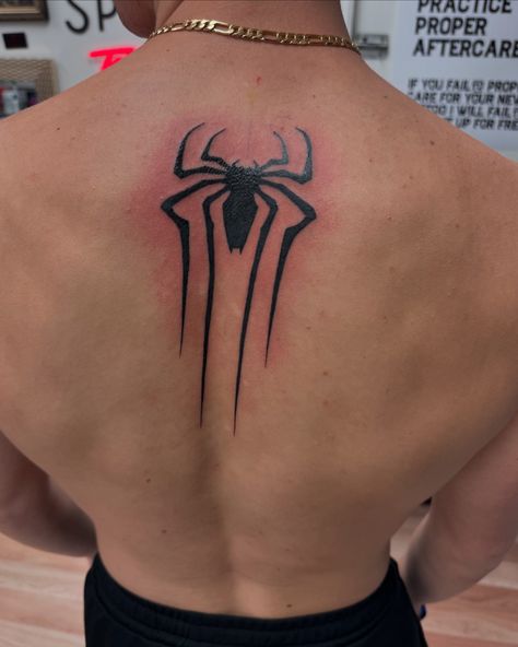 Been a bit behind on posting on this account recently, so no time like the present to start getting this caught up! A few weekends ago, at 43 years old, I got my first tattoo with my oldest, who was getting his first ink too and wanted us to get matching ones. He picked it out, and as a lifelong Spider-Man fan, I had zero issues with his choice! This tattoo is more than just ink. As he starts college this week, and turns 18 next month, this tattoo essentially marked the end of “his weekend... Spider Man Back Tattoo, Spiderman Back Tattoo, Spiderman Tattoo For Guys, Marvel Tattoo Ideas, Spider Man Tattoo, Memory Tattoos, Spiderman Tattoo, No Time Like The Present, Waist Tattoos