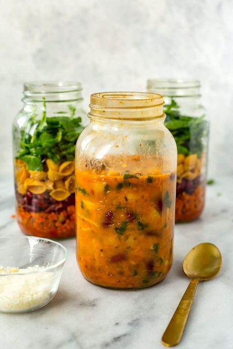 18. Vegetarian Minestrone Soup Jars #greatist https://greatist.com/eat/mason-jar-meal-prep-recipes Soup Jars, Vegetarian Minestrone, Mason Jar Soup, Vegetarian Minestrone Soup, Mason Jar Meal Prep, Instant Meals, Mason Jar Lunch, Salad Jar Recipe, Jar Meals