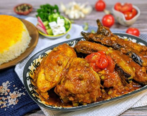 خورشت بادمجان با مرغ Khoresh Bademjan is a well known, popular and respected dish that finds itself served frequently and proudly on a Persian table. Eggplant, otherwise known as the potato of Iran, is used in a variety of stews, Kuku (egg-based dishes), and layered rice dishes. The very special and unique ingredient in this … Continue reading Khoresh Bademjan – Eggplant stew with chicken → Khoresh Bademjan, Stew With Chicken, Persian Food Iranian Cuisine, Eggplant Stew, Persian Chicken, Chicken Eggplant, Iranian Cuisine, Persian Cuisine, Eggplant Dishes