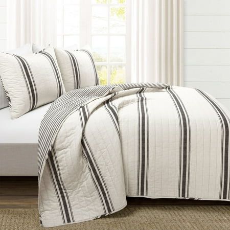 We know how much you love our Farmhouse Stripe Comforter Set, so we're now offering the same design in our new Farmhouse Stripe Reversible Cotton Quilt Set! Decorate your primary bedroom, guest bedroom, teen's bedroom or dorm room with this traditional farmhouse style reversible quilt set. The printing on this set will pair perfectly with your farmhouse shiplap beams. Our Farmhouse Stripe Reversible Cotton Quilt Set is reversible, giving you two stylish looks in one great set! The back of both t Bedding Set Black, Farmhouse Shiplap, White Bed Set, Cotton Quilt Set, Striped Quilt, Lush Decor, Farmhouse Bedding, Bedroom Guest, Inspire Me Home Decor