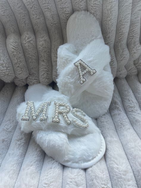 Personalised bridal slippers! MRS along with your personalised initial for examples MRS T, please add this to the personalisation box  Gorgeous embellished letter detail on the front! Perfect for honeymoon, a bridal or wedding gift, hen do or treating yourself in your bridal era ️ 3 sizes available please include the size you need in personalisation  Due to the item being personalised please allow 2-3 weeks for creation plus postage (I will always endeavour to get these to you ASAP) Slippers Wedding, Bridal Slippers, Wedding Slippers, Hen Do, Bride To Be, Cosmetic Bags, Hen, Wedding Gift, Cosmetic Bag