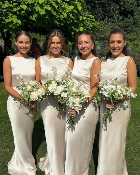 Celebrating Mr & Mrs Dodd! 💐 These beautiful bridesmaids wore our most popular dress 'Joy in Champagne Gold Satin' for the celebration of @homewithkat_ wedding day. For a chance to be featured on our page, be sure to tag us, or send your wedding photos via DM. 💌 We LOVE to see them! Are you looking for a high-quality, sustainable dress for your bridesmaids? ✨ Discover our elegant range of bridesmaid dresses that are perfect for each season. Please click the link in our bio. #bridesmaids... Ivory Silk Bridesmaid Dresses, Classic Elegant Bridesmaid Dresses, White Gold Bridesmaid Dresses, Winter Wedding Colors Gold Champagne Bridesmaid Dresses, Champagne Wedding Bridesmaid Dress, Bridesmaids Fall Colors, Champagne Winter Bridesmaid Dresses, Bridesmaid Elegant Dresses, Off White Bridesmaids