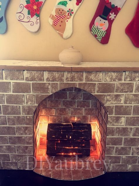 How To Make A Cardboard Fireplace, Diy Fireplace Backdrop, Card Board Fireplace, Diy Fireplace Christmas Decor, How To Make A Fake Fireplace, How To Make A Fireplace, Diy Fake Fireplace Cardboard, Pretend Fireplace, Temporary Fireplace