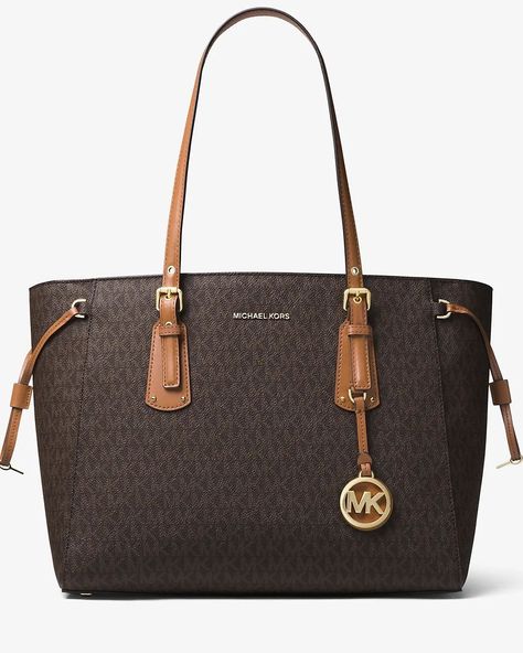 MICHAEL KORS Voyager Medium Logo Tote Bag TAKING PREORDER FROM MICHAEL KORS OFFICIAL WEBSITE COLOR : VANILLA, BROWN DETAILS : • 67% Coated Canvas/17% Polyester/14% Cotton/2% Polyurethane • Gold-Tone Hardware • 16.5"W X 10.5"H X 6.25"D • Handle Drop: 8.5" • Imported #michaelkors #michaelkorsbags #michaelkorsinnepal #luxurybagsinnepal #luxury #luxurybagsnepal #luxurybagsnearme #michaelkorsbag Logo Tote Bag, Michael Kors Tote Bags, Media Logo, Big Bags, Fitness Beauty, Michael Kors Bag, Luxury Bags, Michael Kors, Tote Bag