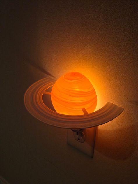 An Adorable little nightlight That's perfect for the nursery or bedroom for any future astronaut Night Light is switch activated, comes with the night light, planet bulb cover, and one bulb Outlet Night Light, Light Science Project, Space Themed Kitchen, Alien Home Decor, Cool Night Lights, Space Themed Decor, Cozy Room Lighting, Space Room Aesthetic, No Overhead Lighting