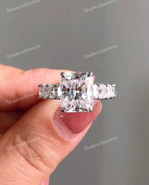 2.45 CT Emerald Cut Certified Diamond Ring, Emerald Diamond Step Ring, Lab Grown Diamond Engagement Ring, 14K Gold Wedding Gift Prupose Ring ● DIAMOND DETAILS → Total Diamond Weight: 5.55 CTW → Center Stone Certification: IGI/GIA → Center Diamond Shape: Emerald Cut → Center Diamond Weight:  2.45 Ct → Color: G → Clarity: VS1 → Side Stone Diamond Shape: Emerald Cut/Round Cut → Side Stone Weight: 3.10 CT ● JEWELRY DETAILS → Metal Options: 10K/14K/18K Solid Gold, Or Platinum → Metal Finish: Yellow / Rose / White Gold → Metal Stamp On Jewelry: Yes → Metal Report: Yes (Ships with Orders) → SKU No: SOJ177 ● SHADES OF JEWELRY SERVICES → Customised/Personalised Handmade jewelry → 80+ antique and fancy cuts and shapes of lab-grown diamonds including more than 10 colors of diamonds → Made in a good e Radiant Cut Moissanite Ring, Sterling Silver Wedding Rings, Art Deco Wedding Rings, Image 3d, Lab Grown Diamonds Engagement, Emerald Color, Silver Wedding Rings, Pave Ring, Hidden Halo