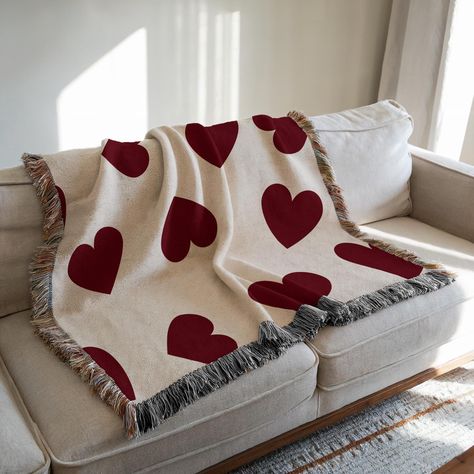 Wrap yourself in the warmth of love with our Heart of Love Cotton Throw Blanket. This cozy woven blanket features an allover heart pattern in rich red on a creamy background, perfect for snuggling on the couch or adding a romantic touch to your bedroom decor. With tasseled edges and three size options (52x37", 50x60", 60x80"), it makes a thoughtful Valentine's Day, anniversary, or wedding gift. The 100% cotton material is soft, breathable, and machine washable for easy care. Cuddle up with this Heart Of Love, Creamy Background, Wedding Anniversary Presents, Heart Blanket, Snuggle Blanket, Cute Couple Gifts, Cotton Throw Blanket, Presents For Mom, Cotton Throw