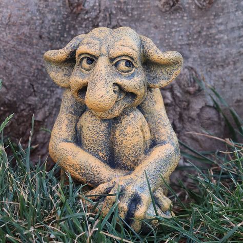 PRICES MAY VARY. 【Garden Gargoyle Statue】: A small gargoyle, sitting on the ground, holding his legs with his hands, and looking up with a slanted eye, showing cuteness under its ugly appearance. Resin decorative sculptures with unique appearance are placed in the garden to attract the attention of everyone who visits. 【High-Quality 】: Gargoyle ornaments are handmade with high-quality resin, safe and durable, not easy to fade, the surface has a protective coating, are not afraid of wind and sun, Hand Statue Sculpture, Gargoyle Sculpture, Gothic Sculpture, Gargoyle Statue, Funny Garden Gnomes, Dragon Garden, Unique Garden Art, Decor Statue, Garden Gnomes Statue