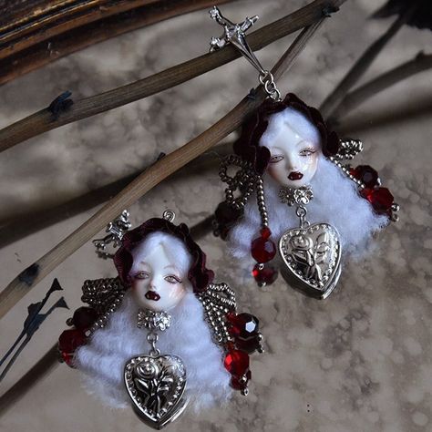 These Vampire Princess II Gothic Doll Jewelry are a unique and striking addition to any gothic or Art Doll collection. Handcrafted by our skilled artisans, each piece is made with ultra-light clay, resin clay, wool or rayon, and metal fittings. The result is a lightweight earring that is comfortable to wear all day long. These earrings are designed with a creepy cute doll aesthetic and measure approximately 8x3.4 cm (3.15 x 1.34 inches) in size. Please note that the price is for a single earring or brooch, and if you want a pair of earrings, please order two. To take care of your earrings, avoid soaking, squeezing, tearing, rubbing, or scratching them, and store them in a box when not wearing them. Vampire Doll Aesthetic, Gothic Resin Art, Porcelain Doll Art, Spooky Jewelry, Creepy Cute Aesthetic, Doll Earrings, Vampire Princess, Light Clay, Stud Earrings Unique