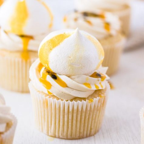 These Passionfruit Coconut Cupcakes start with an easy coconut cupcake recipe, thats filled with passionfruit curd and topped with coconut buttercream. Total tropical vibes. Coconut Cupcake Recipes, Coconut Cupcake, Passionfruit Curd, Coconut Buttercream, Fruit Cupcakes, Tropical Desserts, Coconut Frosting, Coconut Cupcakes, Coconut Cream Pie