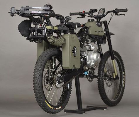 A motorized bike for post-apocalyptic regulating. "The Survival Bike: Black Ops Edition hits the trail with a compound crossbow, fuel storage, shovel, tomahawk, harpoon, blade saw, climbing gear, lights and a smattering of tools and knives." - from Motoped Echipament Tactic, Sepeda Retro, Bug Out Vehicle, Motorized Bicycle, Apocalypse Survival, Zombie Survival, Adventure Motorcycling, Fat Bike, Camping Survival