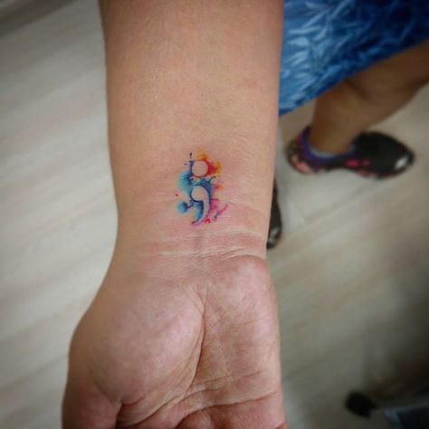 Project Semicolon. Obrigada, Adriana! #atelietattoodf #atelietattoo #tessia #tessiaaraujo #projectsemicolon #projectsemicolontattoo #watercolortattoo #watercolor #braziltattoo #brasil Semicolon Tattoo Meaning, Colon Tattoo, Tiny Watercolor, Semicolon Tattoo, Watercolor Tattoos, Disney Tattoo, Small Tattoo, Tattoo Fonts, Meaningful Tattoos