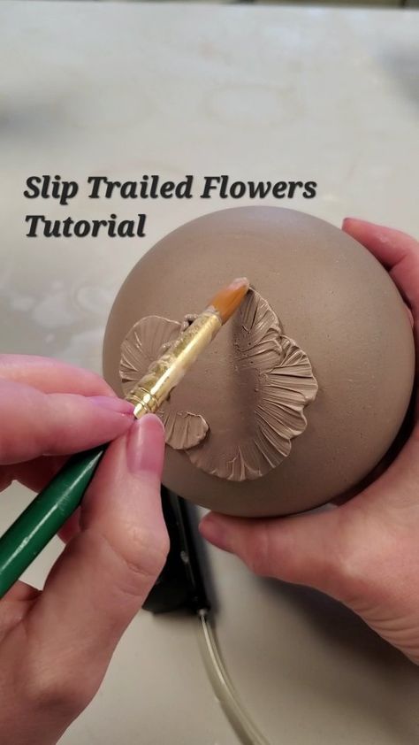 Lyndsey Roberts | Ceramic Arts | This is how I made the flower pattern on my crock! . . . #sliptrailing #sliptrailingpottery #porcelain #porcelainslip #crock… | Instagram Ceramic Slip Trailing, Slip Trailing Pottery Design, Slip Trailing Pottery Patterns, Ceramic Slip Design, Porcelain Luminaries, Slip Decoration Pottery, Slip Trailing Designs, Pottery Shirts, Slip Trailing Pottery