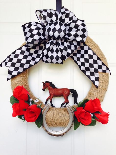 The derby wreath I made! The horseshoe is one that was actually used at Churchill downs. Kentucky Derby Games, Derby Wreath, Derby Decor, Kentucky Derby Decorations, Kentucky Derby Theme, Kentucky Derby Themed Party, Derby Party Food, Kentucky Derby Party Decorations, Horse Racing Party