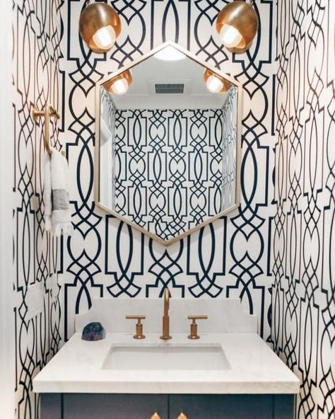 I love bold wallpaper in every room. An accent wall in the bathroom is one of my favorites. Which wallpaper is your favorite? Navy Blue Powder Room, Blue Trellis Wallpaper, Blue Powder Rooms, Blue Powder Room, Sink Mirror, Powder Room Wallpaper, Statement Wallpaper, Trellis Wallpaper, Bad Inspiration