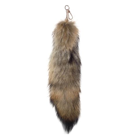 PRICES MAY VARY. Imported fur Hook closure Real Black Fox Tail Keychain - with gold key chain, the fox fur is farm raised foxes and not wild. We pay attention to protecting the environment and wildlife, and fox breeding has always been an important industry. Soft Huge Fox Fur Tail Keychain - the animal fox tail is very big, about (16 - 17 inches) / (40 - 45 cm) in length. You can even hang it on your bag, more charming and attractive. All tails are carefully selected, maybe longer or shorter. Ev Therian Den, Therian Tail, Coyote Tail, Toy Costume, Deer Tail, Fox Tails, Fox Tail Keychain, Tail Keychain, Wolf Tail