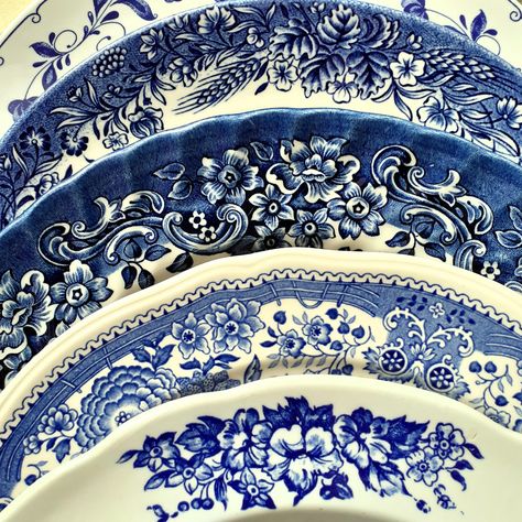 A set of six mismatched blue and white transferware plates. A one-off curated collection, perfect for displaying on a country cottage dresser or for weddings and vintage tea parties. Each plate pattern is different, each is equally as lovely. These look absolutely charming when layered on top of each other. You will receive exactly this set of plates. This collection weighs 3.3kgs/ 7.27 lbs altogether. There is one large dinner plate measuring 26cms/ 10¼" diameter. It is marked "17th Century Eng Cottage Dresser, Blue And White Plates, Vintage China Patterns, Blue White China, Blue And White Dinnerware, Vintage Tea Parties, Plate Pattern, Transferware Plate, Blue Transferware