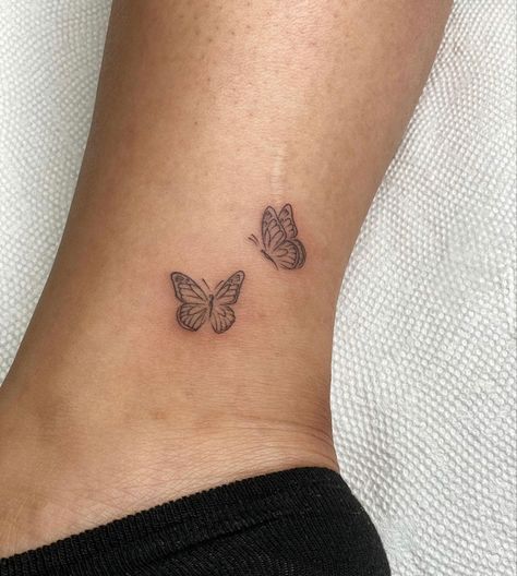 Small Buterfluffy Tattoo Ideas, Ankle Tattoo Butterflies, Small Butterfly Tattoo On Wrist Simple, Butterfly Dainty Tattoo, Small Butterfly Ankle Tattoo, Ankle Tats For Women, Rib Cage Butterfly Tattoo, Small Butterfly Tattoo On Ribs, Butterfly Ankle Tattoos For Women