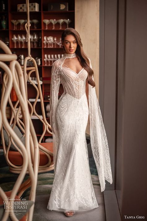 tanya grig 2024 bridal sheer long sleeve high neck sweetheart neckline embellished bodice column sheath wedding dress chapel train victoria 3 -- Tanya Grig 2024 Wedding Dresses | Wedding Inspirasi #wedding #weddings #bridal #weddingdress #weddingdresses #bride #fashion #collection:AllYouNeedisLove #label:TanyaGrig #week:312023 #year:2024 ~ Luxury Wedding Dress With Sheer Sleeves, High Neck Long Sleeve Boho Wedding Dress, Long-sleeved Wedding Dress With Cutdana, Long Sleeve Cutdana Wedding Dress, High Neck Bell Sleeve Wedding Dress, Column Sheath Wedding Dress, Turtle Neck Wedding Dress, White Beaded Dress, 2024 Wedding Dresses