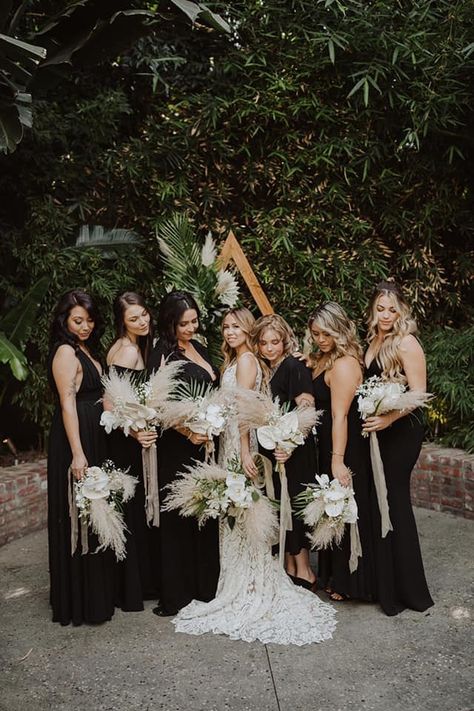 Dark Boho Bridesmaid Dress, Black Bridesmaid Dresses Boho Flowers, Boho Wedding Black Bridesmaid Dresses, Pampas Grass Wedding Black, Spring Wedding With Black Bridesmaid Dresses, Black Bridesmaid Dresses Tropical Wedding, Boho Black Bridesmaid Dresses, Different Color Bridesmaid Dresses Boho, All Black Boho Wedding