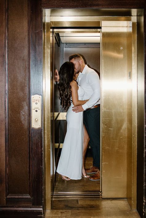 An Engagement Photoshoot at the Oxford Exchange in Tampa, Florida. Bride wearing a long white dress in the elevator. Editorial Engagement Photos, Indoor Engagement Photos, Classy Vibes, Classy Engagement Photos, Tampa Wedding Venue, Oxford Exchange, Courthouse Wedding Photos, Couple Engagement Pictures, City Engagement Photos