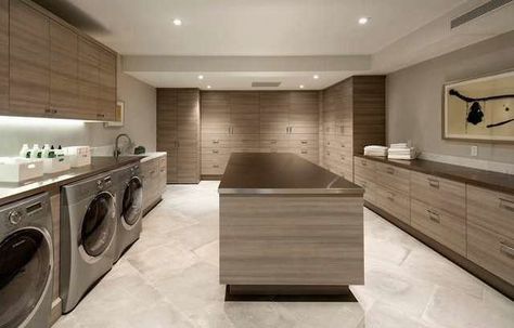 “I’m seeing two of everything, like dishwashers, stoves, and fridges in separate areas, especially in open-concept homes,” Traub says. Though buyers love the look of an open floor plan, it’s not the ideal setup for entertaining, so they want to keep some things–like kitchen prep areas–out of sight. Dream Laundry Room, Laundry Room Flooring, Large Laundry Rooms, Modern Laundry Rooms, Desain Furnitur Modern, Laundry Design, Laundry Room Inspiration, Laundry Room Remodel, Laundry Closet