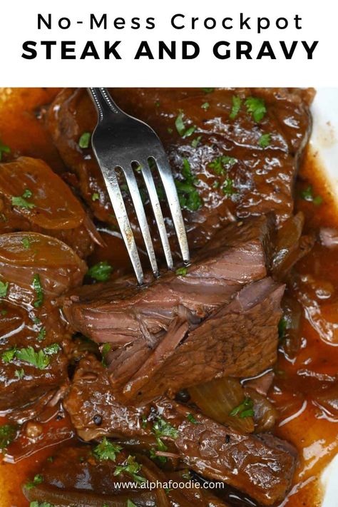 Turn up the flavor on steak night with this no-mess, no-fuss crock pot steak and gravy recipe that's succulent, tender, and swimming in a rich steak gravy. Classic Round Steak And Gravy, Smothered Steak In Crockpot, Steaks In Crockpot Slow Cooker, Top Round Steak Crock Pot, Steak And Gravy Recipe Crockpot, Recipe For Round Steak In Crockpot, Beef Chuck Tender Steak Recipes Crock Pot, Slower Cooker Steak Recipes, Steak Dinner Crockpot