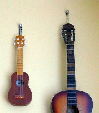 How To Hang Guitars On The Wall Diy, Hang A Guitar On The Wall Diy, Diy Guitar Mount, Guitar Hanging Ideas Diy, Diy Guitar Wall Hanger, How To Hang Guitars On The Wall, Hang Guitar On Wall, Guitar Hanging Ideas, Guitars On The Wall