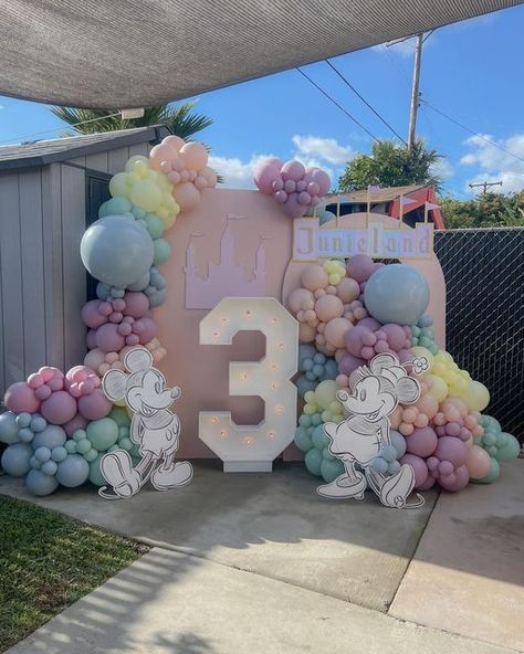 Create with Kait LLC on Instagram: "Classic Disney theme but in pastel? Sign me up please!   I am OBSESSED this design. Maybe I’m just forever meant to be Disney girl at heart, but I mean it when I say absolutely adore the disney trend. I hope it’s here to stay! 😍 the only thing this was missing was more jumbos but I forgot my bag at home 😞 💔 but still doesn’t make it oh so cute!   Thank you as always Valerie for trusting my vision for your babies 💓  Big thank you to @that_wood_be_cool for always coming through! Saved me with this signage 😍   #retrodisney #oldschooldisney #disneythemedbirthday #classicdisneybirthday #disneylandtheme #pasteldisney" Pastel Disney Theme Party, Disneyland 3rd Birthday, Vintage Disney Balloon Garland, Disneyland Birthday Party Backdrop, Disneyland Birthday Backdrop, Disneyland 2nd Birthday, Disneyland Balloon Garland, Disneyland Backdrop Party Ideas, Disneyland Theme First Birthday