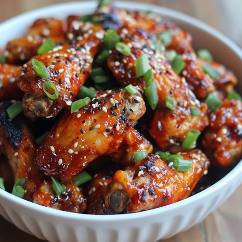 🍗 Try Korean Chicken Wings—crispy, sticky, and packed with savory-sweet flavor. Perfect for game day or any day! 🎉🔥 #KoreanChickenWings #DeliciousWings Korean Chicken Wings Ingredients: Chicken wings (2 lbs) Soy sauce (1/4 cup) Gochujang (Korean chili paste) (2 tbsp) Honey (2 tbsp) Garlic, minced (3 cloves) Ginger, minced (1 tbsp) Sesame oil (1 tbsp) Green onions (for garnish) Instructions: Marinate chicken wings in soy sauce, gochujang, honey, garlic, ginger, and sesame oil for at least ... Marinate Chicken Wings, Chicken Wings Crispy, Wings Crispy, Korean Chicken Wings, Marinated Chicken Wings, Korean Chili, Korean Chili Paste, Marinate Chicken, Korean Chicken