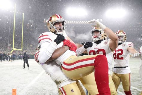 San Francisco kicker Robbie Gould is lifted by a teammate after he kicked a field goal to win an NFL playoff game in Green Bay, Wisconsin, on Saturday, January 22. The 13-10 victory moved the 49ers into the NFC Championship game. Snow Football, 49ers Game, Lesean Mccoy, Lincoln Financial Field, Green Bay Wisconsin, Nfl 49ers, Lambeau Field, Nfl Playoffs, Just For Men