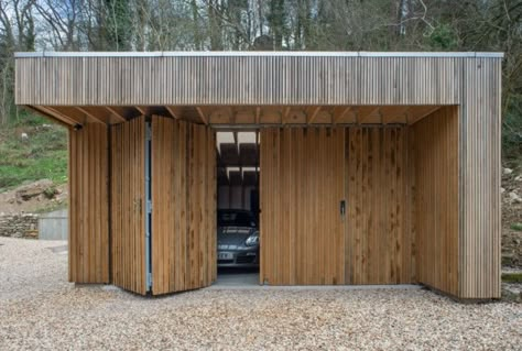 Upstairs, Downstairs: A Workshop and Garage Hidden in a Hillside - Gardenista Feilden Fowles, Garage Workshop Plans, Car Shed, Modern Garage Doors, Garage Workshop Organization, Upstairs Downstairs, Garage Studio, Carport Garage, Carport Designs