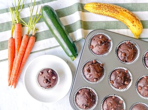 These moist, delicious double Chocolate Zucchini Carrot Muffins are loaded with fruits and veggies, thanks to the addition of a banana and a full cup of zucchini and carrots. Apple Zucchini Muffins, Carrot Oatmeal Muffins, Choc Muffins, Carrot Zucchini Muffins, Zucchini Vegetable, Banana Carrot Muffins, Banana Zucchini Muffins, Toddler Muffins, Zucchini Carrot