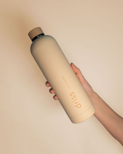 Discover driss insulated stainless steel water bottle by Porter Green, the perfect stylish and sustainable accessory for every activity. This 1L thermos water bottle is designed with double-walled insulation to keep beverages hot or cold for up to 24 hours. Ideal for storing water and other drinks, driss is also frequently used as an insulated wine bottle for outdoor entertaining, making it the ultimate 1L drink bottle for every occasion. Colour every experience with wheat + oat driss by Porter Neutral Water Bottle, Water Bottle Designs, Stylish Water Bottles, Storing Water, Trendy Water Bottles, Thermos Water Bottle, Sustainable Accessories, Cute Water Bottles, Best Water Bottle