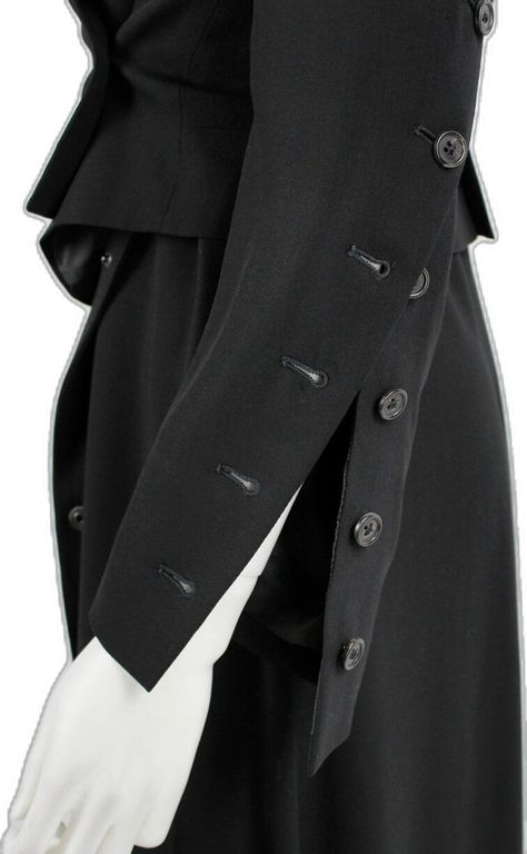 Ann Demeulemeester black jacket with buttons twisting around the sleeves — fall 2010 - V A N II T A S Button Detail Fashion, Ann Demeulemeester Jacket, Feminine Streetwear, Fashion Archive, Utilitarian Style, Button Up Jacket, Archive Fashion, Clothing Details, Mood Board Fashion