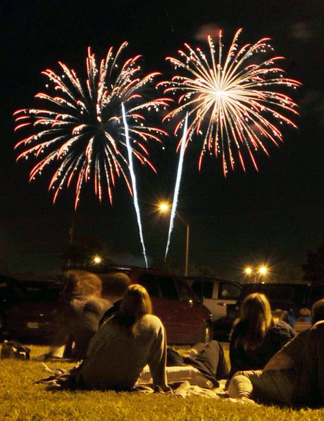 A group of people sits together to watch the city of Ames’ fireworks display from the Iowa State Center parking lot on Thursday night in Ames. Photo by Nirmalendu Majumdar/Ames Tribune People Watching Fireworks, Alameda County Fair, Firework Display, Printmaking Inspiration, Watching Fireworks, Summer Vision, A Group Of People, Friends Group, Pure Happiness