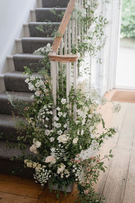 Floral staircase at Treseren Cornwall. Lyra & Moth Photography. Wedding Staircase Decoration, Staircase Wedding, Wedding Stairs, Nude Bridesmaid Dresses, Wedding Staircase, Virginia Beach Wedding, Modern Wedding Venue, Staircase Decor, All White Wedding