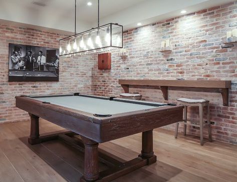 The brick walls on this basement really make it look more rustic and the small wood bar on the side and wood surround on the pool table make it just the right mix. Plus the wood floor improves the whole look. Basement Games, Pool Table Room, California Beach House, Basement Lighting, Rustic Basement, Game Room Basement, Small Basements, Lan Can, Pool Rooms