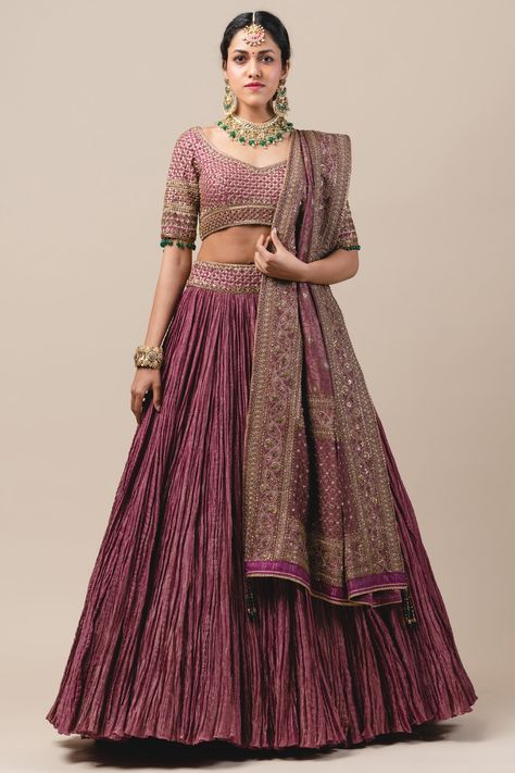 Featuring a purple lehenga in chanderi base with striped zari embroidery and a belt. It is paired with a matching blouse and a brocade drape.  FIT: Fitted at bust and waist. COMPOSITION: Brocade, Chanderi. CARE: Dry clean only. Crushed Lehenga, Chanderi Lehenga, Indian Outfits Lehenga, Wedding Lehenga Designs, Gaun Fashion, Choli Designs, Lehenga Blouse, Tarun Tahiliani, Indian Dress