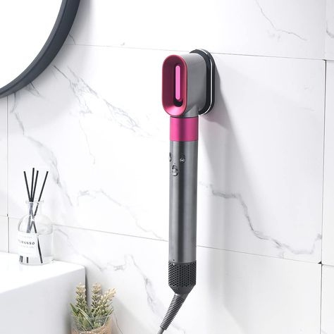 PRICES MAY VARY. ORGANIZE YOUR HAIR TOOLS: Keep your Dyson Airwrap Styler neatly organized with this metal wall mount holder. SAVE SPACE: Free up valuable counter space in your home, bedroom, or bathroom with this stylish and functional storage rack. EASY ACCESS: The wall mount design allows for easy access to your styling tools, eliminating the hassle of searching for misplaced accessories. DURABLE CONSTRUCTION: Made of high-quality metal, this organizer rack is sturdy and secure, ensuring your Hair Curling Wand, Styler Hair, Metal Organizer, Wall Mounted Hair Dryer, Dyson Hair Dryer, Dyson Airwrap, Accessories Organizer, Iron Accessories, Hair Dryer Holder