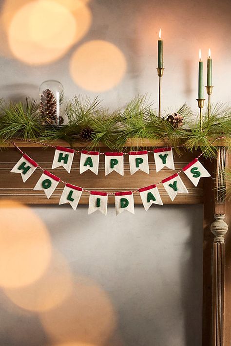 Deck the halls with this festive felted wool garland, which spells out " HAPPY HOLIDAYS" in red-and-green pennants. | HAPPY HOLIDAYS Felt Garland at Terrain Dried Wreaths, Wool Garland, Evergreen Wreaths, Which Spells, Felt Bunting, Anthropologie Holiday, Hygge Christmas, Diy Christmas Garland, Christmas Apartment