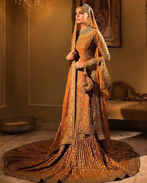 Inbox us to order ✉📬 Or contact 📞 +923074745633 📞☎ (WhatsApp ✔) Orange Gharara, Bridal Gharara, Long Kameez, Pakistani Mehndi Dress, Kameez Lehenga, Lehenga Pakistani, Vintage Color Palette, Pakistani Bridal Lehenga, Bridal Mehndi Dresses