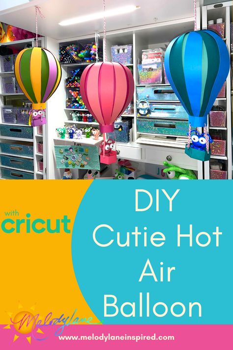 Create your own DIY Hot Air Balloon with your Cricut! Your Cricut Cutie can even ride in it! How To Make Paper Hot Air Balloons, Hot Air Balloon Room Decor, Hot Air Balloon Svg Free, Hot Air Balloon Decorations Classroom, Cricut Hot Air Balloon, Hot Air Balloons Craft, Hot Air Balloon Paper Craft, Giant Hot Air Balloon Diy, Diy Hanging Hot Air Balloon